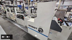Crash lock carton gluer